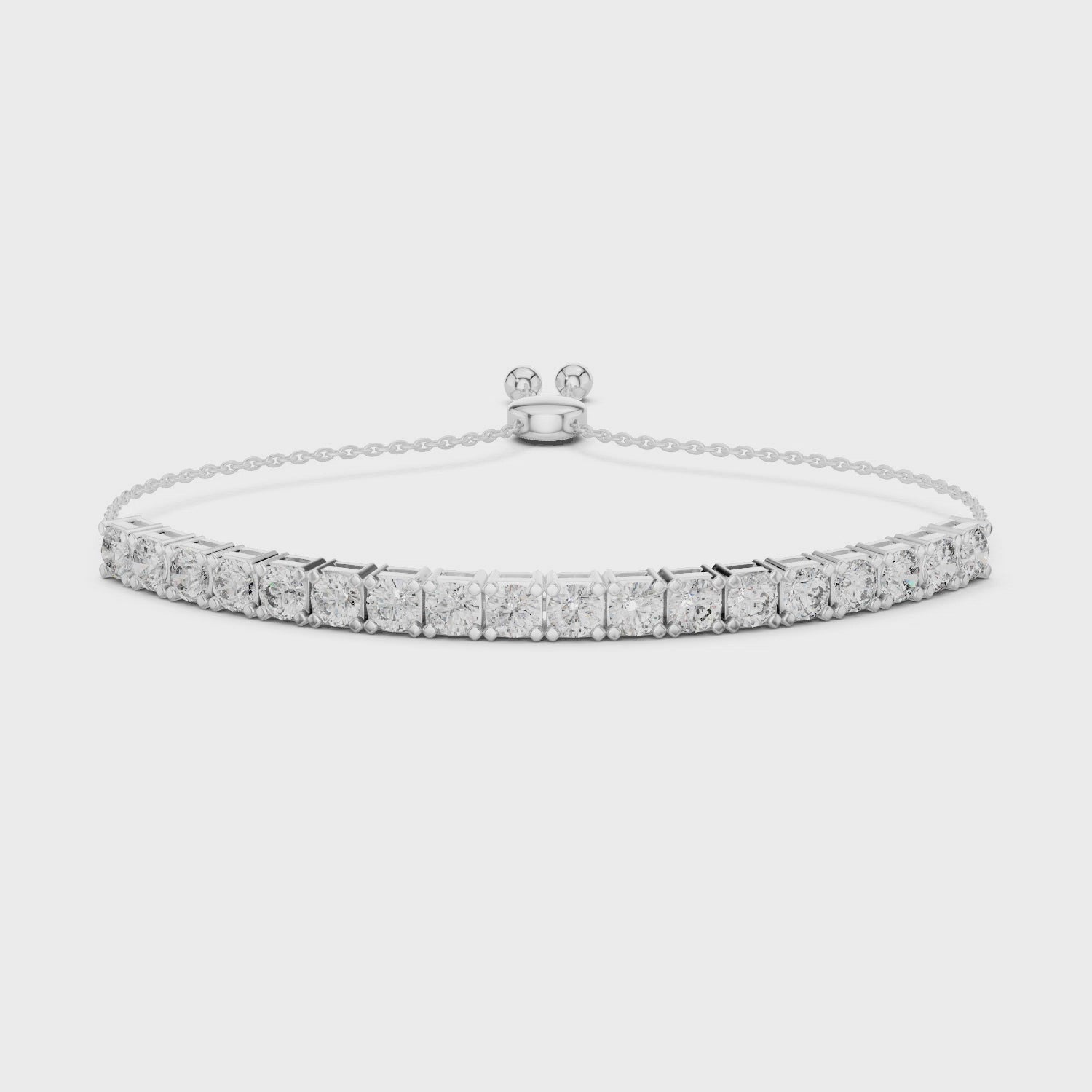 Tennis adjustable slider bracelet with prong set round stone row detailing