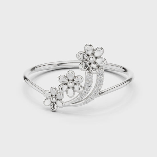 Ladies silver floral cluster ring with three flower motifs and diamond-studded arc