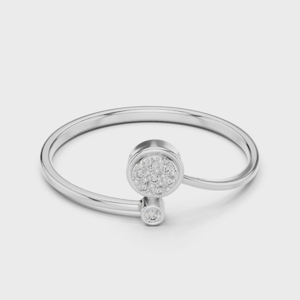 Round pave diamond ring with bezel set solitaire accent