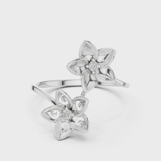 Double floral bypass open ring with sculpted petal blooms and solitaire centres