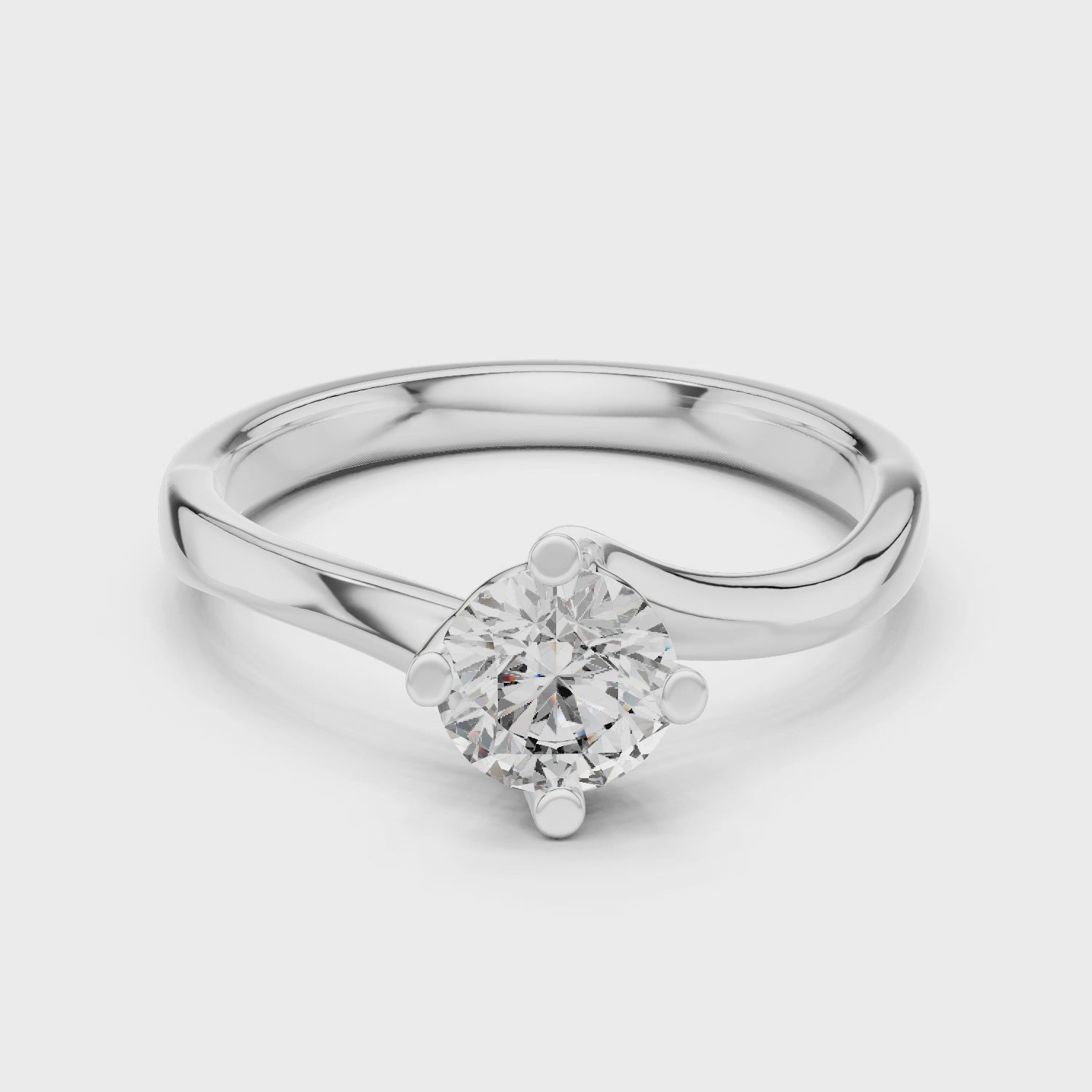 Round solitaire twist engagement ring with four prong setting and flowing bypass band