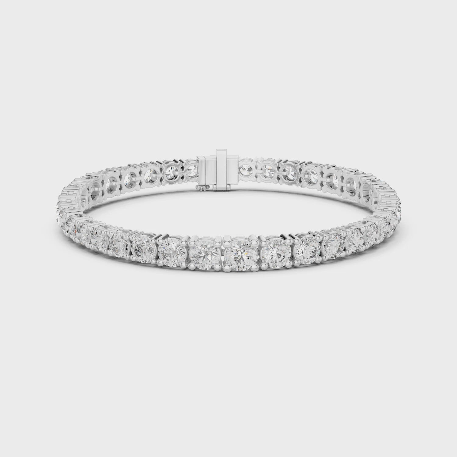 Classic round tennis bracelet with prong set continuous stone row detailing
