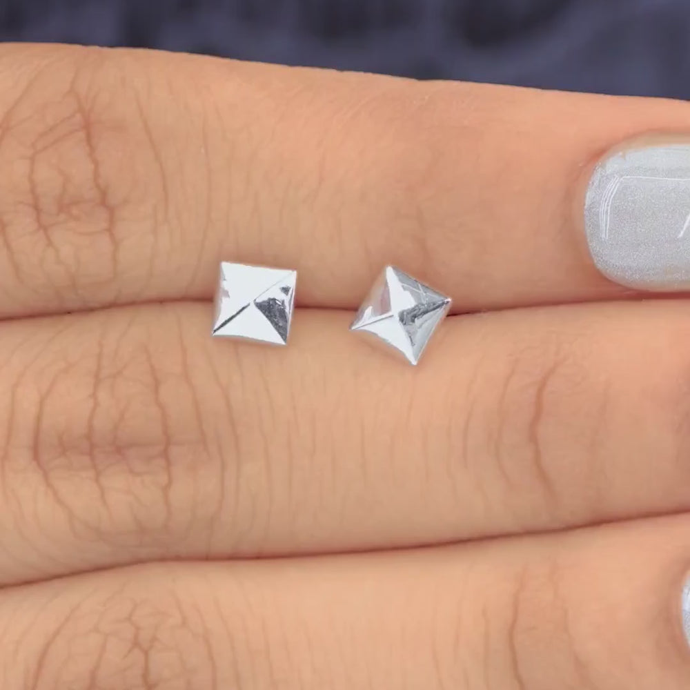 Modern pyramid stud earrings with smooth square base and raised geometric peak