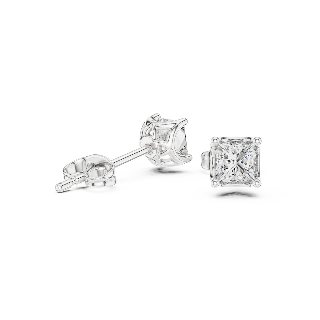 Princess cut solitaire stud earrings with large four prong set square princess cut centre stone