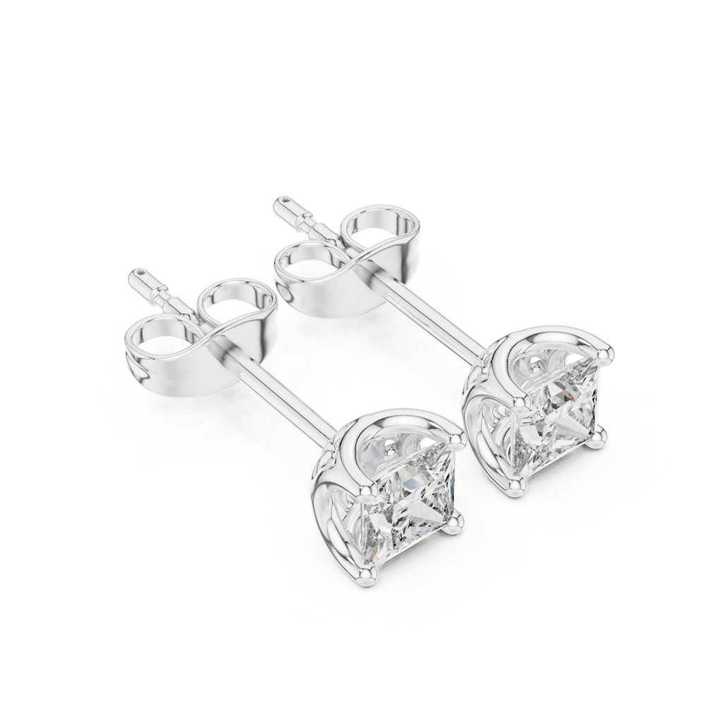 Princess cut solitaire stud earrings with large four prong set square princess cut centre stone