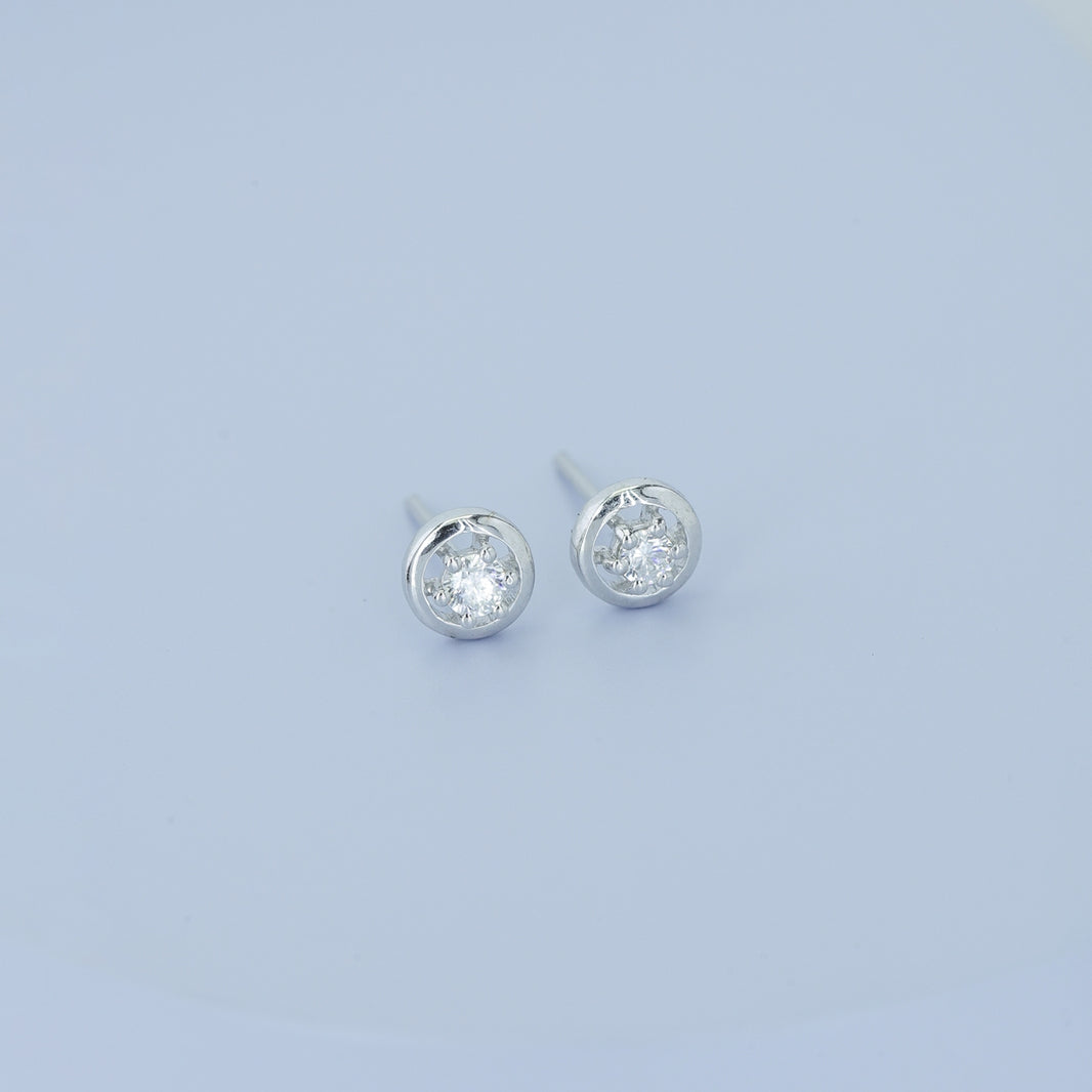 Round halo stud earrings with six claw raised centre and circular border