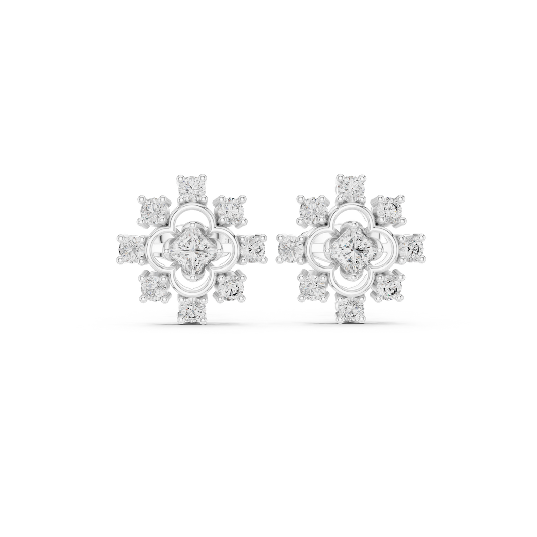 Snowflake cross cluster stud earrings with four petal floral centre in open circle frame and round stone cross pattern surround