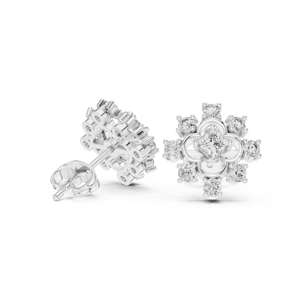 Snowflake cross cluster stud earrings with four petal floral centre in open circle frame and round stone cross pattern surround