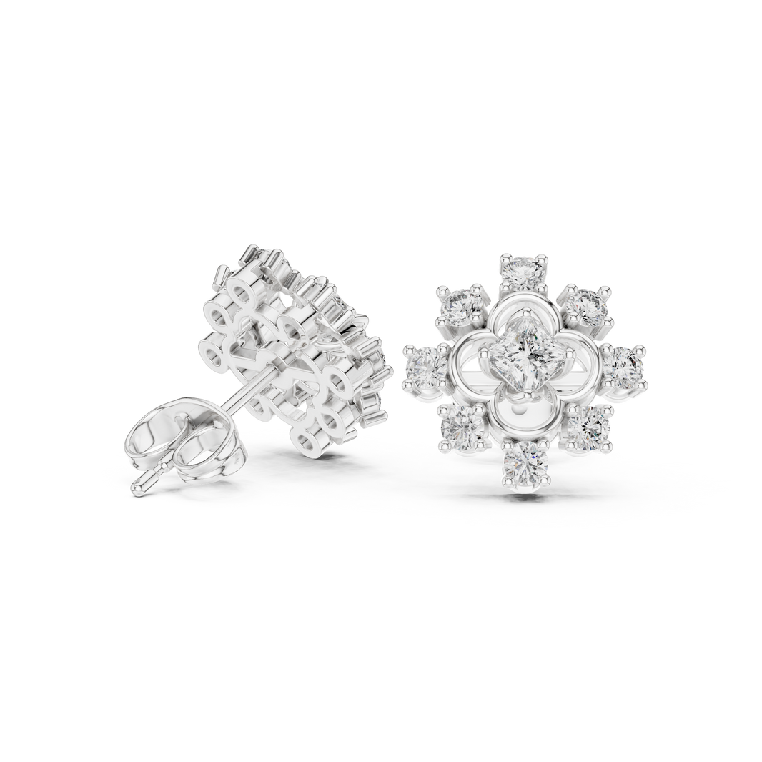 Snowflake cross cluster stud earrings with four petal floral centre in open circle frame and round stone cross pattern surround