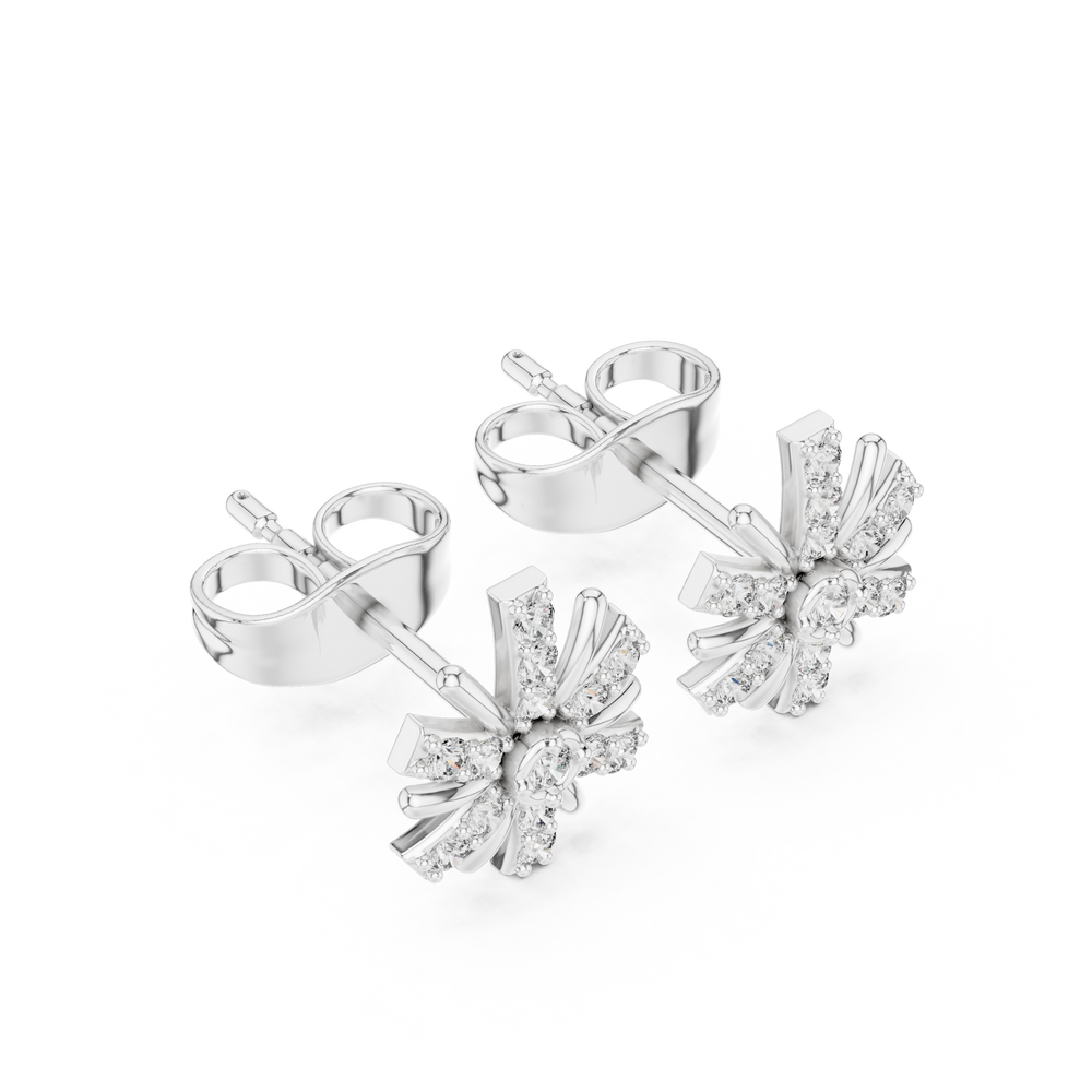 Starburst stud earrings with a bezel-set solitaire centre, pavé-set radiating arms and polished spike accents