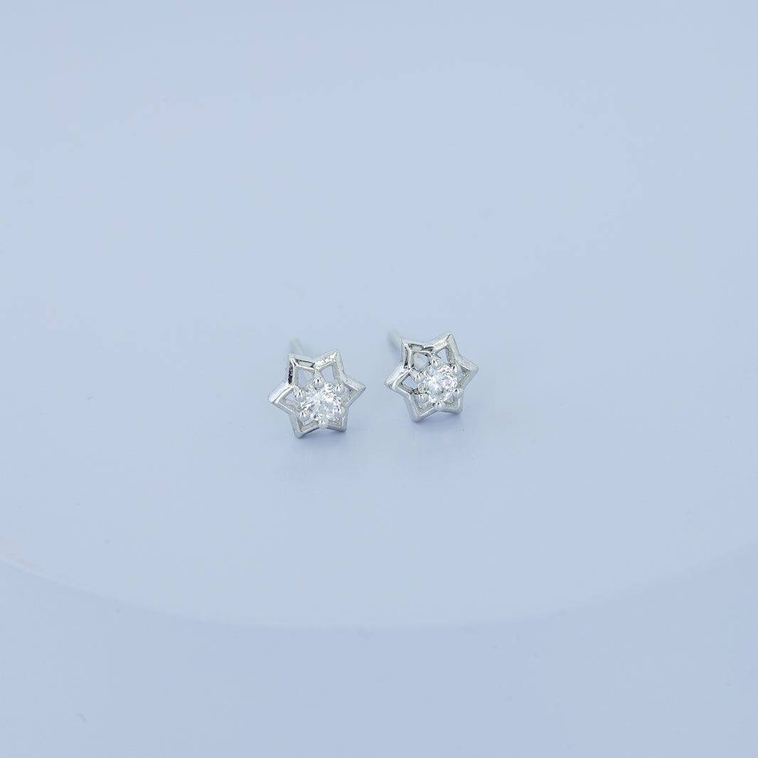 Star burst stud earrings with pointed geometric frame and raised centre