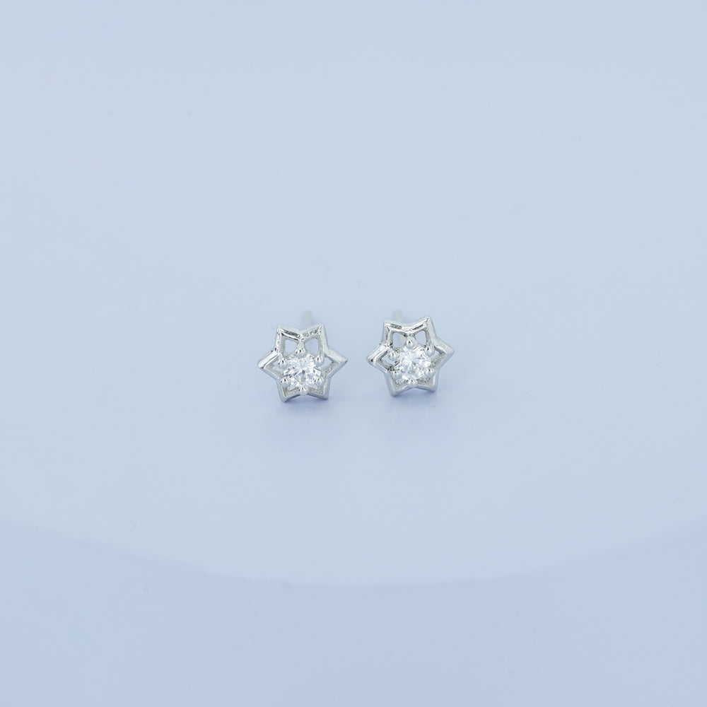 Star burst stud earrings with pointed geometric frame and raised centre