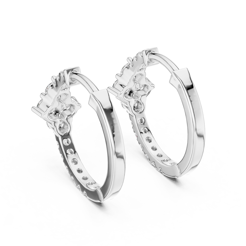 Star cluster pave huggie earrings with pave set band and four point round stone star cluster at centre