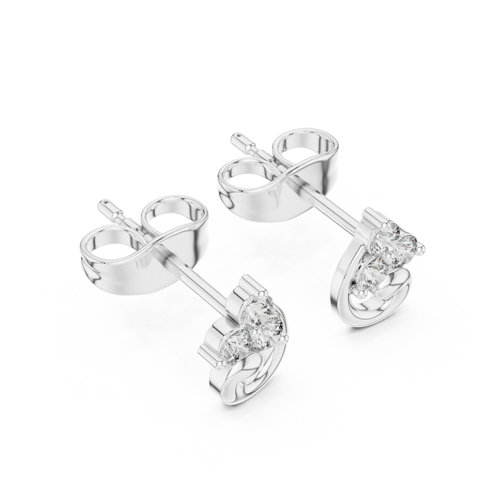 Three-stone round brilliant prong-set stud earrings with a polished swirl curl detail below the cluster setting