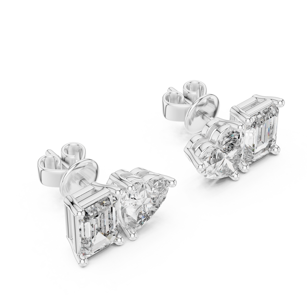 Toi et moi stud earrings with side by side emerald cut and heart shaped stones in prong setting