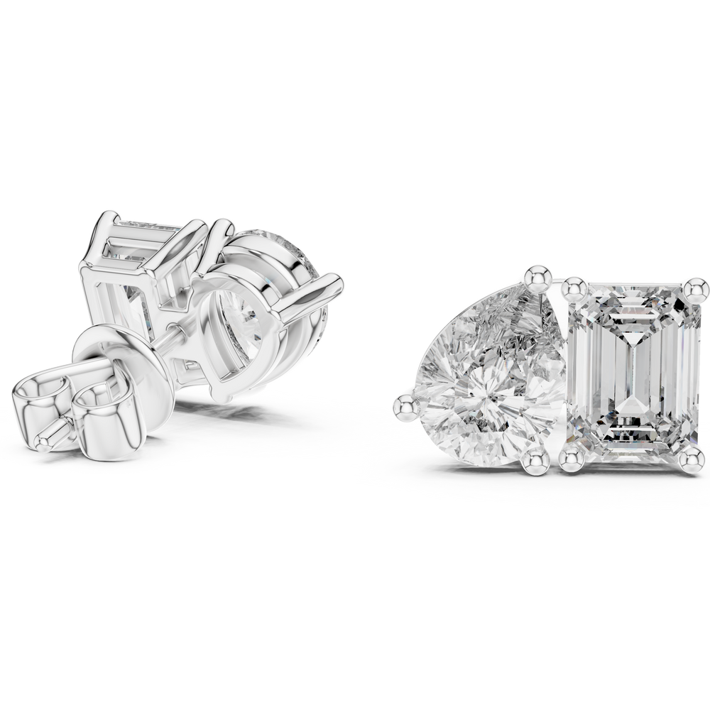 Toi et moi stud earrings with side by side emerald cut and pear shaped stones in prong setting
