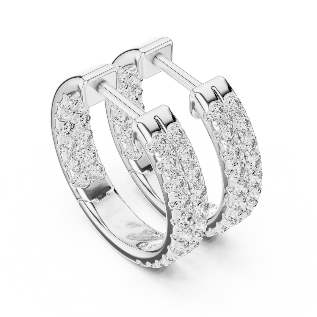 Triple row pave huggie earrings with wide band and three rows of round stones set across the hoop