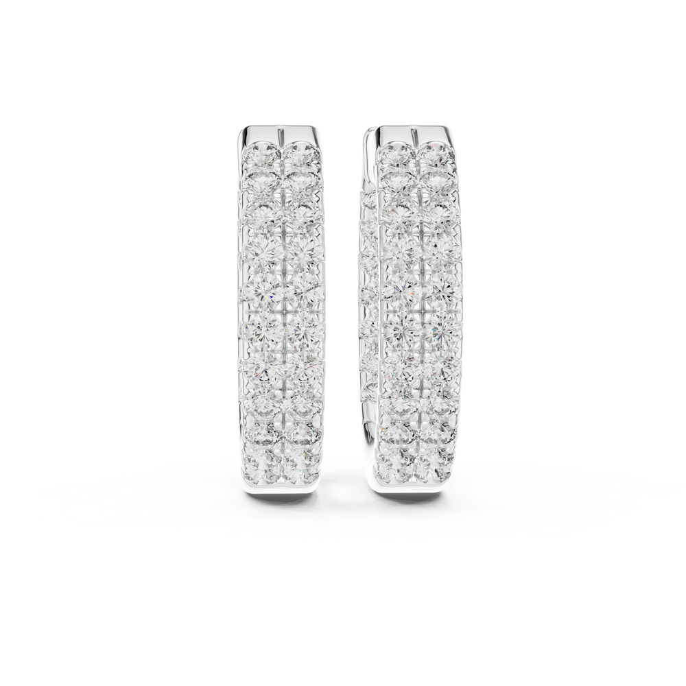 Triple row pave huggie earrings with wide band and three rows of round stones set across the hoop