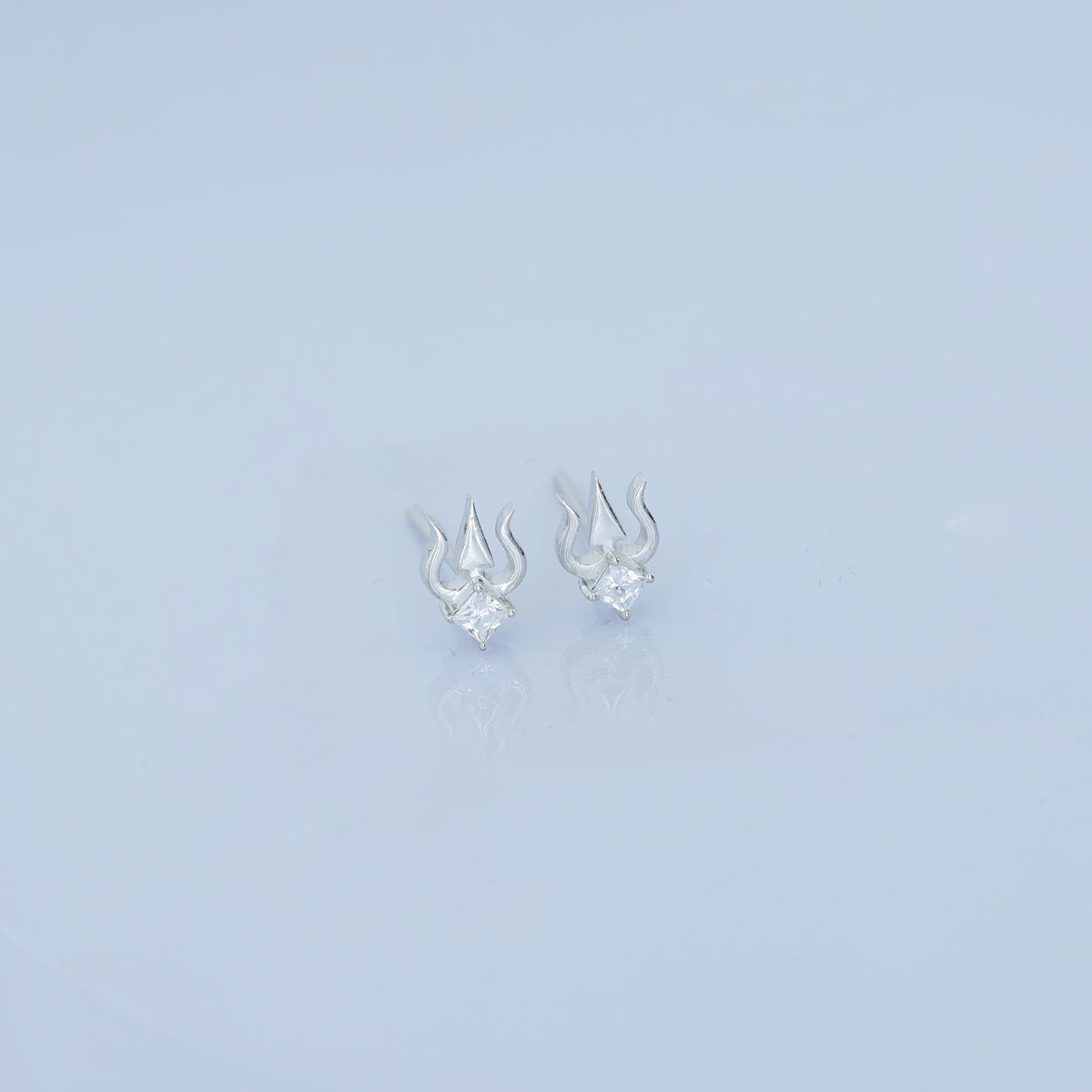 Trishul stud earrings with sacred trident motif and square stone centre