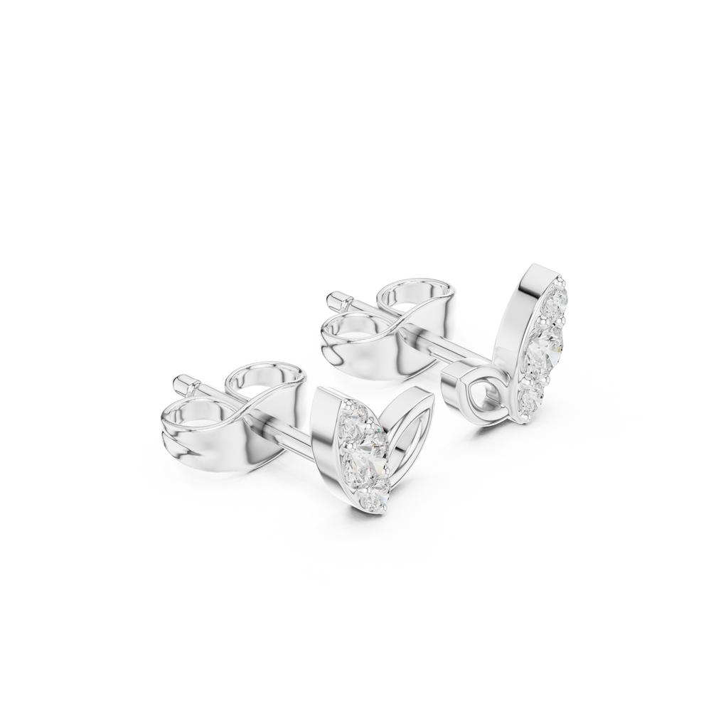 Two-leaf stud earrings with a stone-set pointed leaf and an open polished leaf side by side